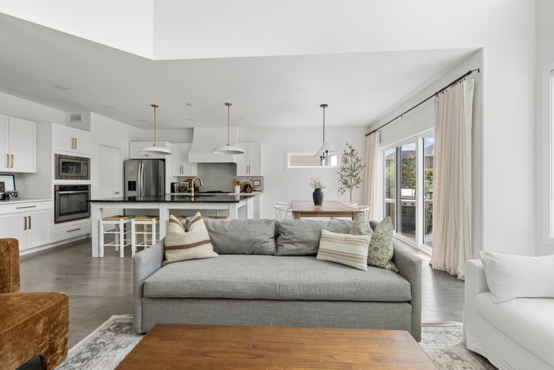Living room viewed from the entry, open to the upper landing