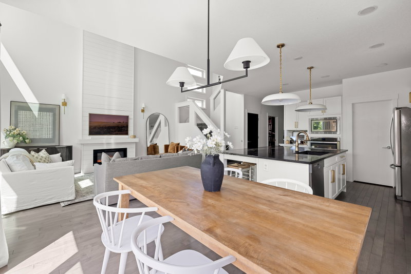 Dining table open to the kitchen and living area