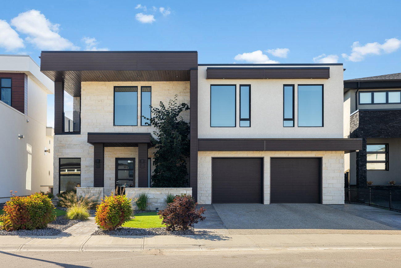 Contemporary two-storey home exterior with a flat roofline