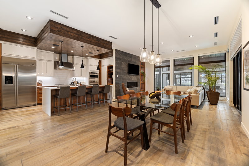 Dining room with a live-edge table and sculptural pendant