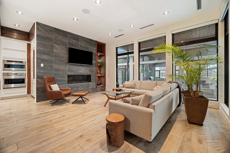 Hearth room seating open to the kitchen beyond
