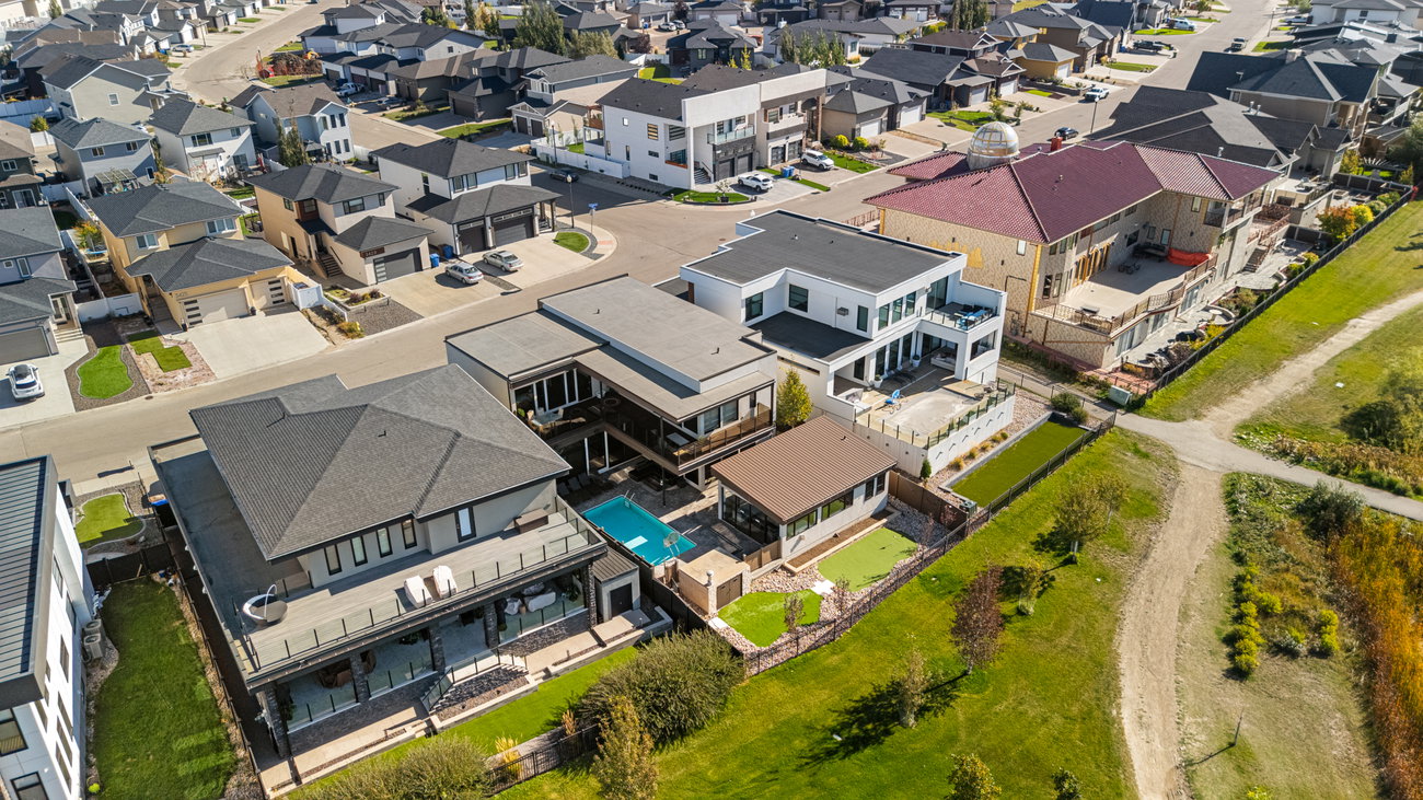 Aerial photograph of the home, pool and backyard from above