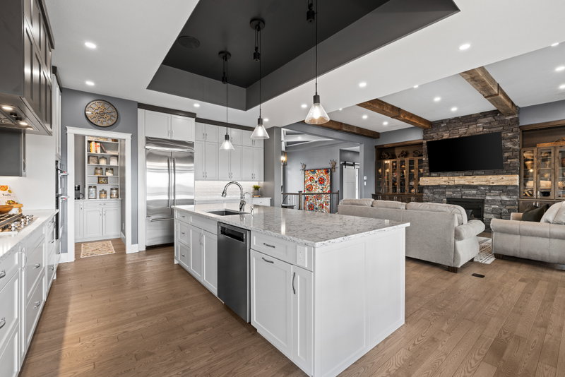 Kitchen island open to the dining area and windows