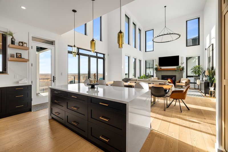Kitchen island open to the dining area and patio doors