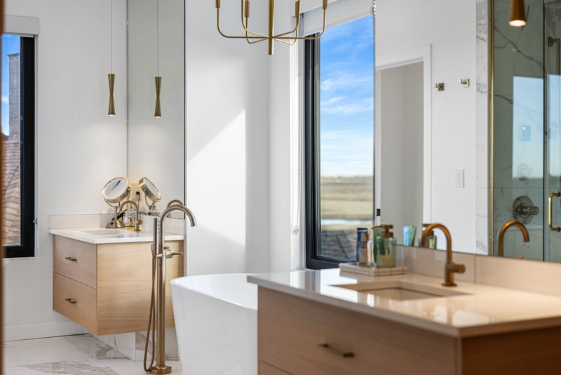 Second bathroom with a glass shower and floating vanity